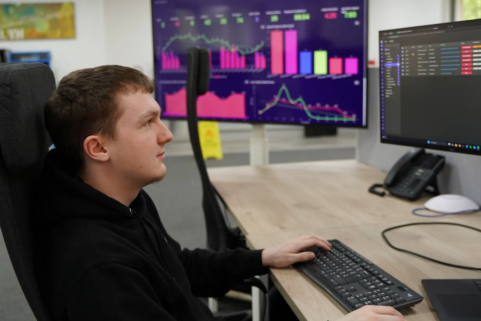 IT support for manufacturers — a Reformed IT engineer monitoring a live operations dashboard